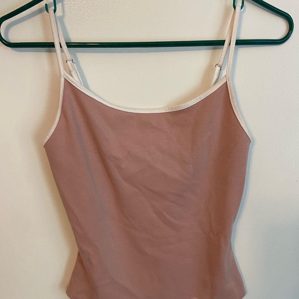 Pink bodysuit with white accent